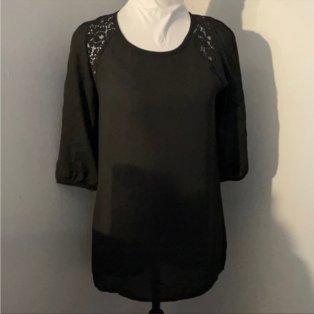 Amber Blue black blouse.